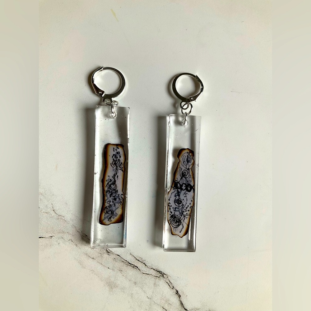 Handmade resin earrings with drawings inside